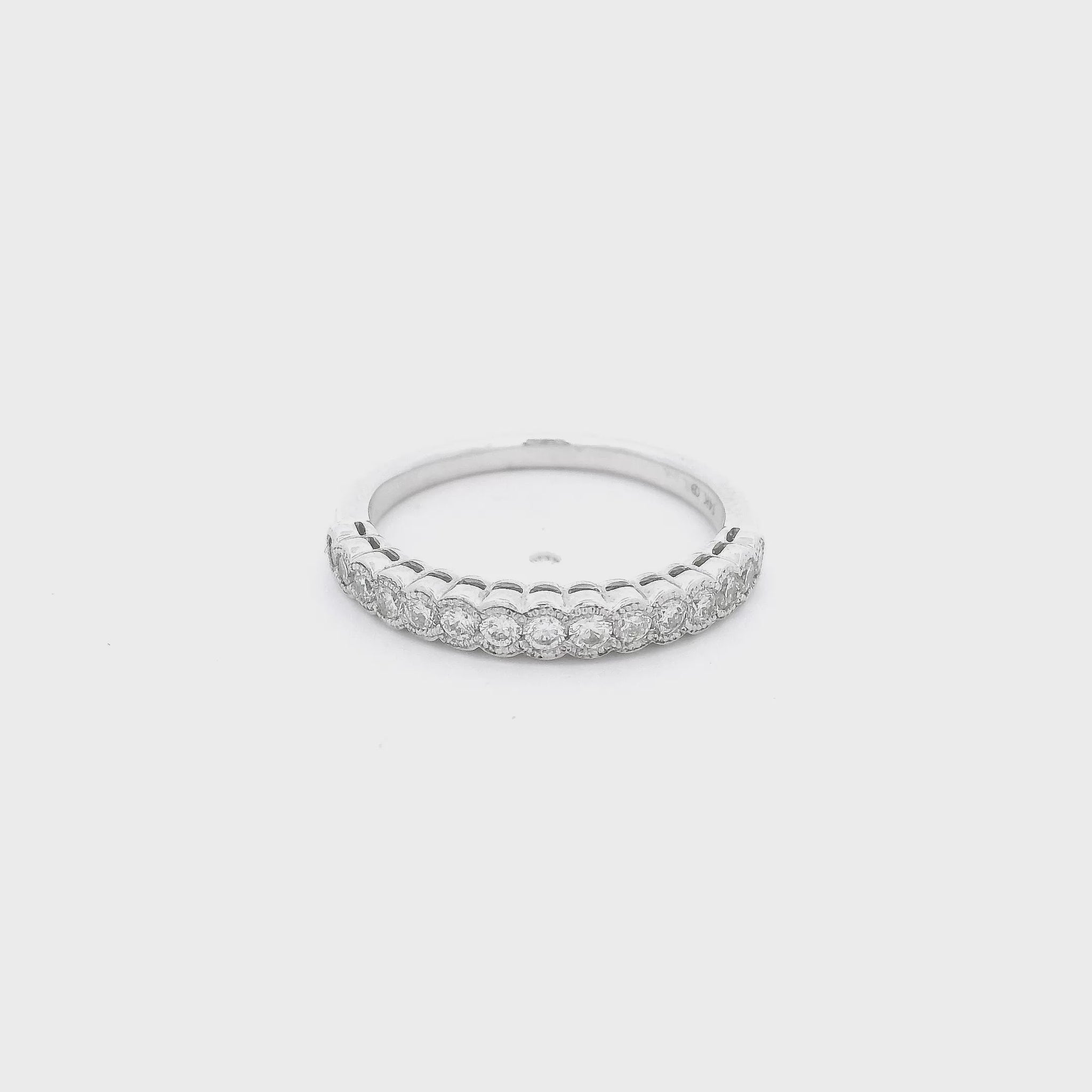White Gold band with diamonds set in milgrain design bezels at Forever Rox Fine Jewelry