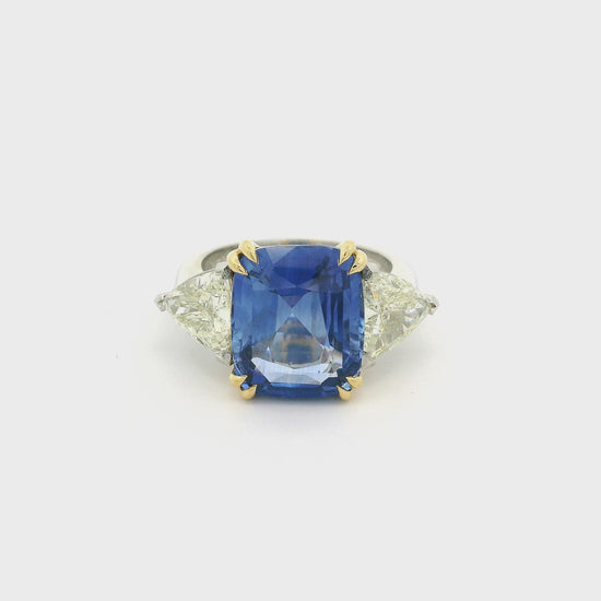 Ring With GIA Certified Cushion Cut Sapphire and Two Trillion Cut Diamonds in Yellow Gold and Platinum at Forever Rox Fine Jewelry