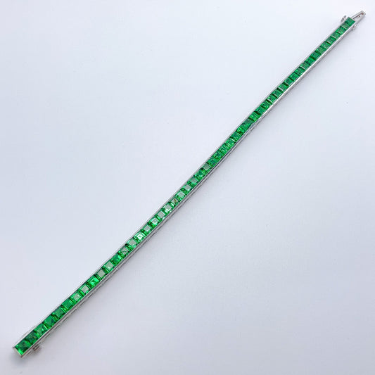 A Platinum Bracelet with square step cut natural Tsavorite Garnets at Forever Rox Fine Jewelry, Lake Tahoes Best Jewelry Store